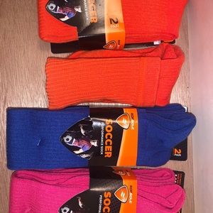 5 pair of NEW soccer socks and 1 used bonus pair